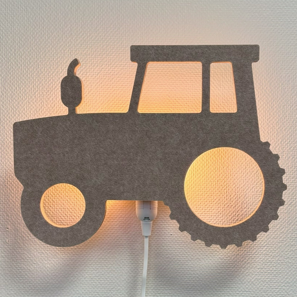 Vilten wandlamp trekker zandbeige – lamp aan