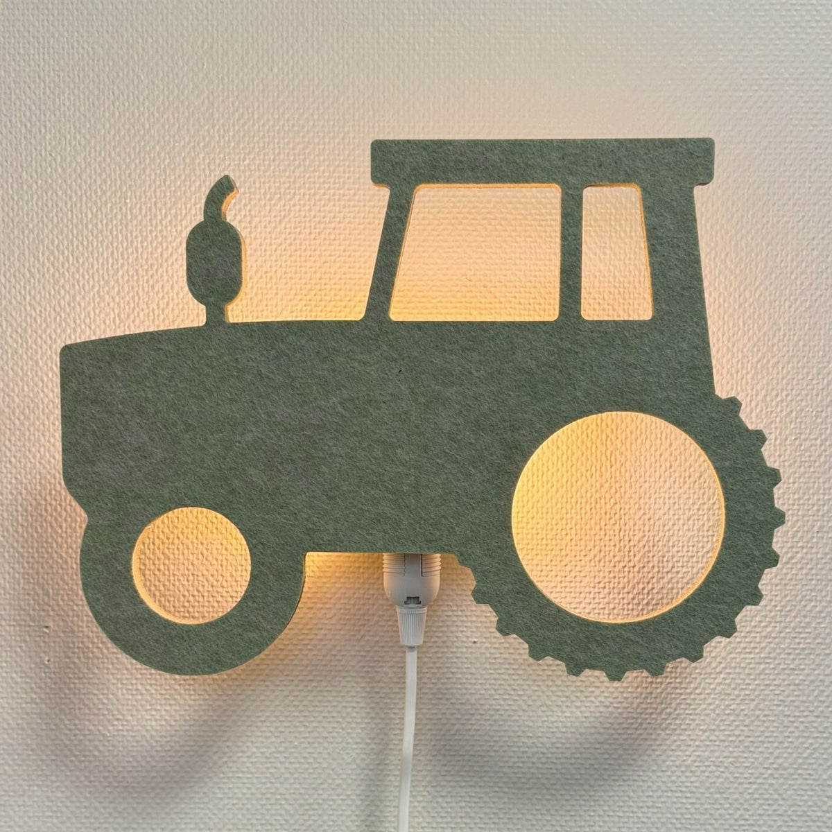 Vilten wandlamp trekker saliegroen – lamp aan